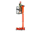 JLG 830P Push Around Lift suspended in the air with a construction worker in the platform.